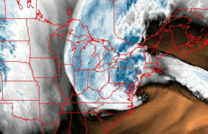 A satellite image of the earth and its clouds.